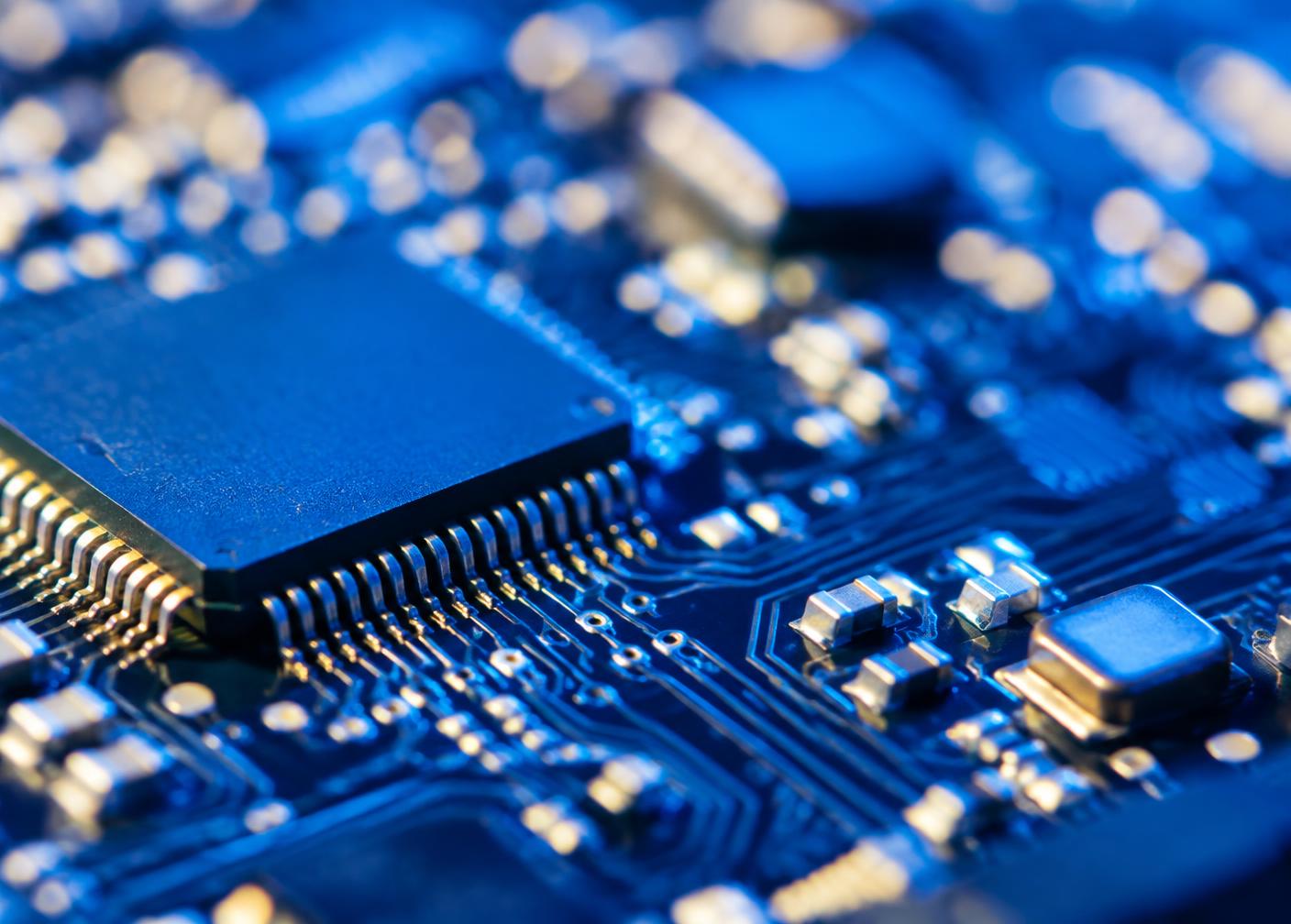 Microchip on a blue circuit board